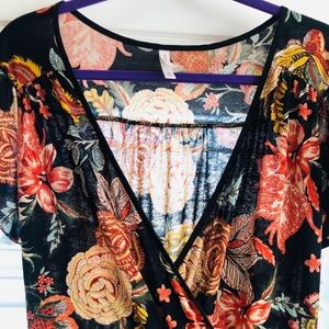 Sheer V neck dress. Floral on black